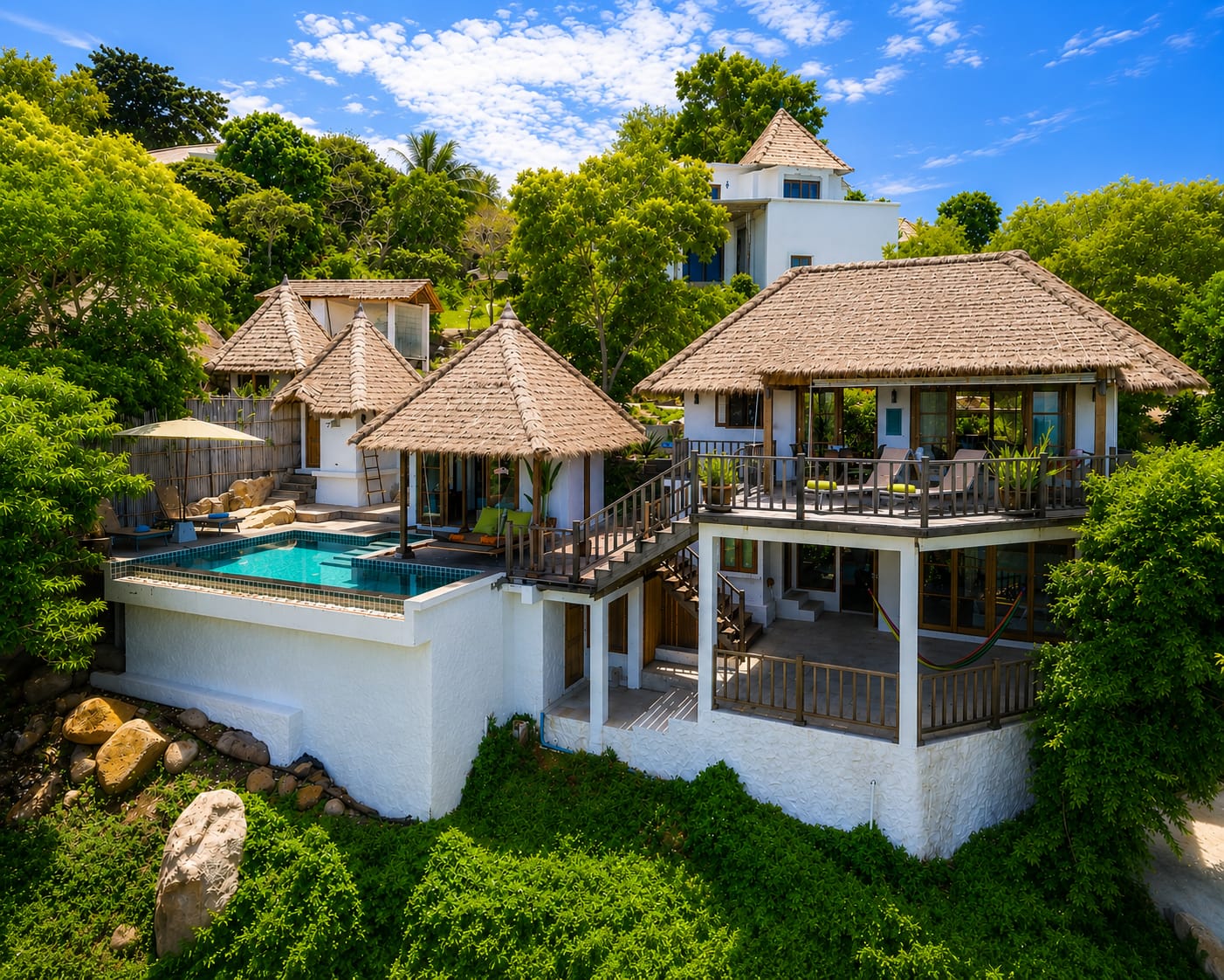 The Fisherman’s House — Our two-storey sanctuary on the highest cape — open teak interiors, a private infinity pool and sweeping views over the ocean and the beach below.