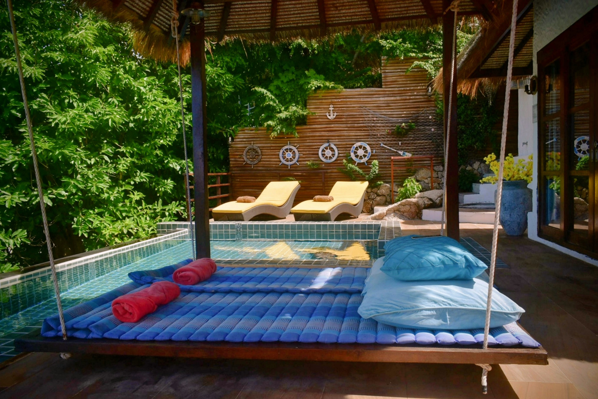 Hanging daybed beside the plunge pool at The Fisherman’s House