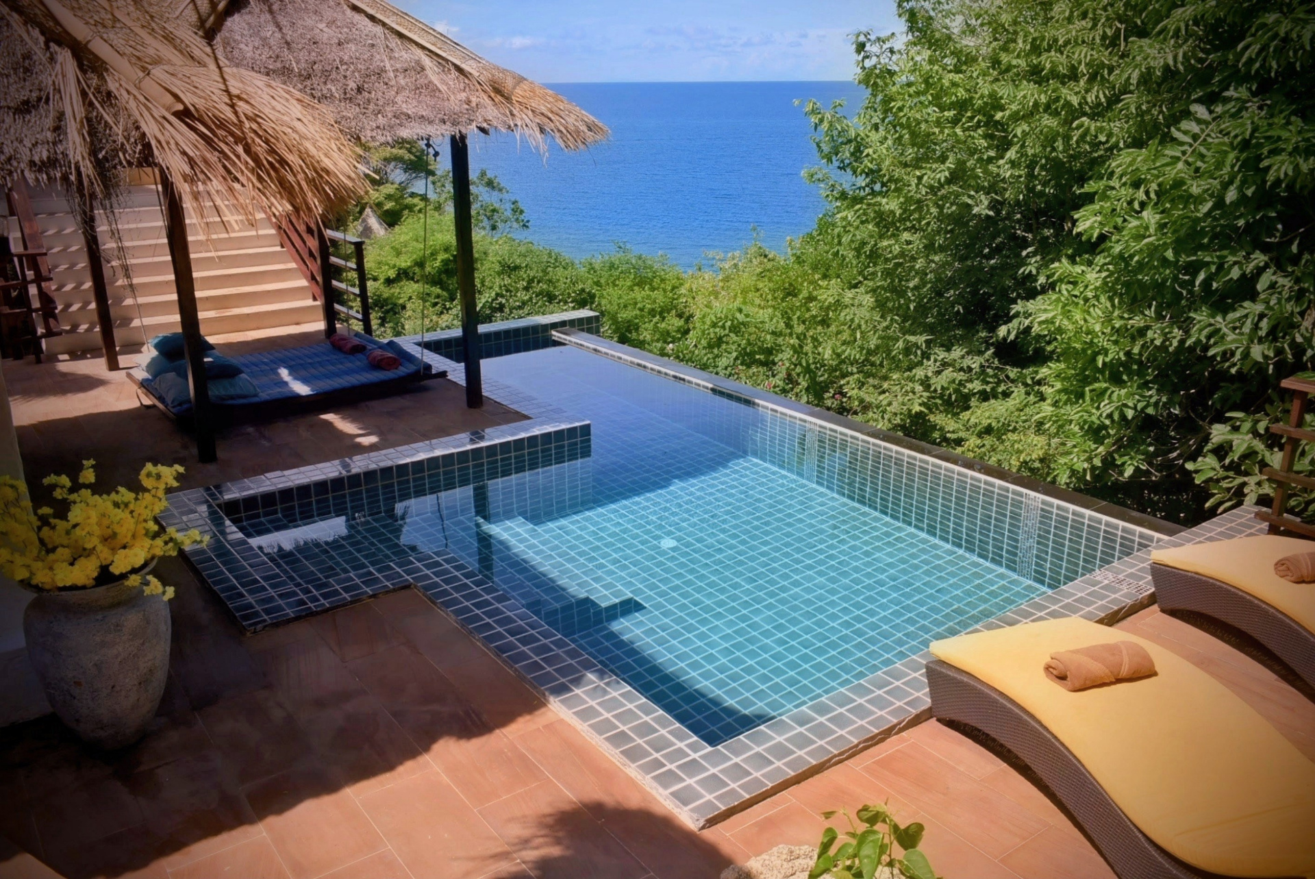 Private pool sala and daybed overlooking the ocean at The Fisherman’s House